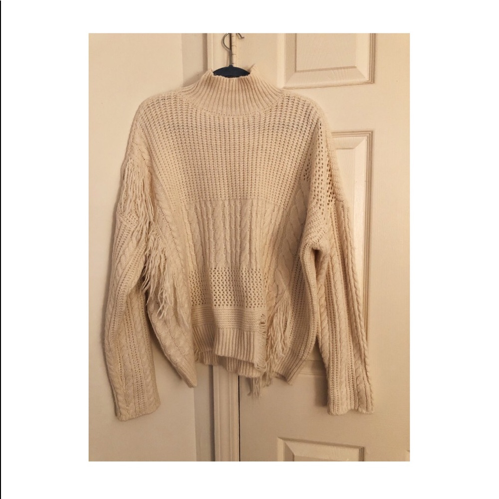 Ivory turtleneck sweater